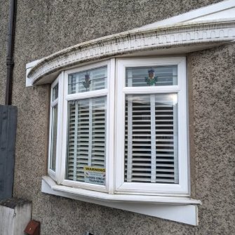 Bow window canopy with dark streaks before